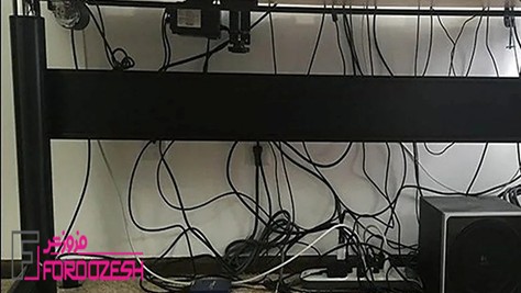 پوشاندن سیمهای پشت تلویزیون برای زیبا سازی محیط